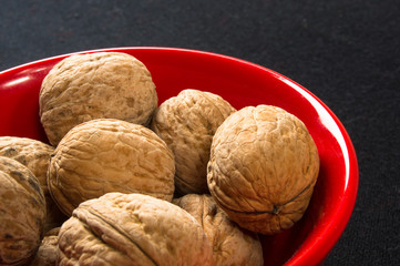 walnuts in red plate