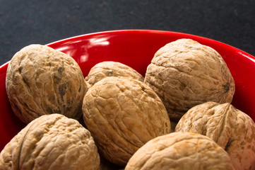 walnuts in red plate