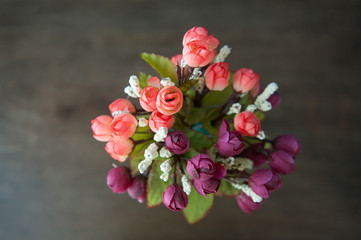 Various flowers on black background. Overhead view.