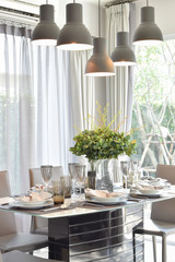 elegant table set in modern style dining room interior