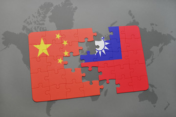 puzzle with the national flag of china and taiwan on a world map background.