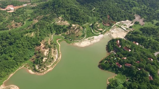 Aerial shot of big reservoir inside public university of Thailand