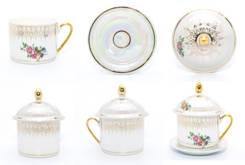 Antique porcelain tea cup on white background