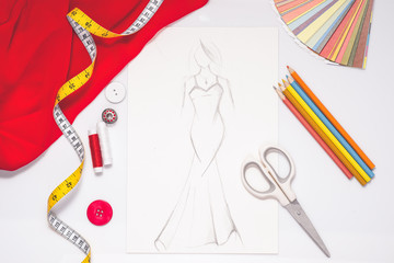 Workplace of fashion designer studio with equipment