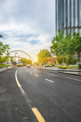 Fototapeta premium empty road front of modern buildings