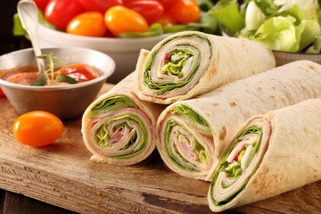 Fresh tortilla wraps with ham cheese and vegetables - 115202532