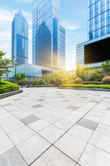 empty pavement and modern buildings in city