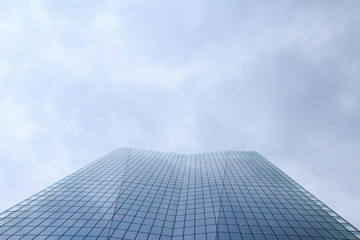 Fototapeta na wymiar Gray sky and high-rise buildings