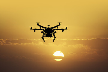drone at sunset - obrazy, fototapety, plakaty