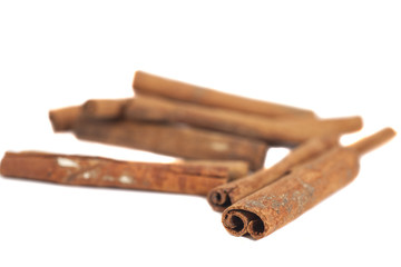 Cinnamon sticks isolated on white