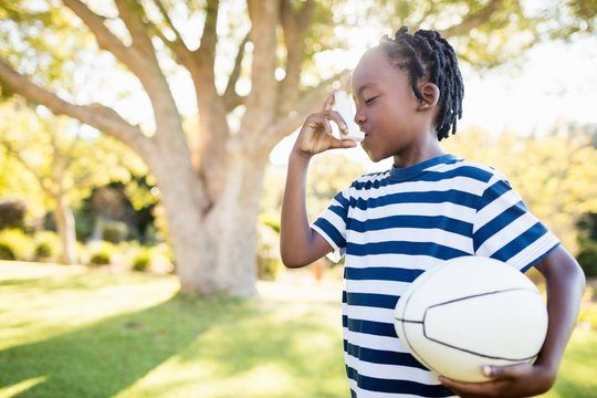 Focus On Child Holding An Object