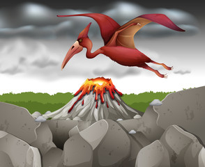 Dinosaur flying over the volcano © blueringmedia