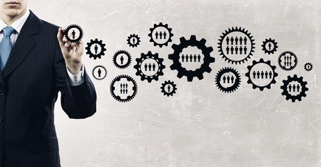 Man presenting teamwork concept . Mixed media