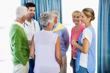 Nurses talking with seniors