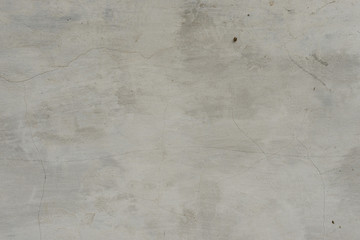 Wall fragment with scratches and cracks