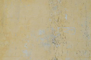 Wall fragment with scratches and cracks
