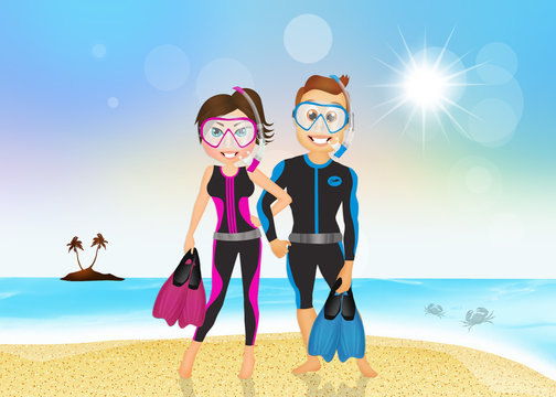 man and woman with fins and scuba mask