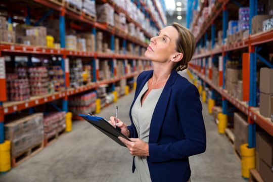 Business Woman Is Concentrating During Her Work 