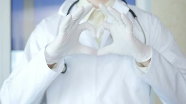 Doctor Showing Fingers Heart