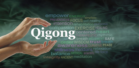 Qigong word cloud and healing hands - female cupped hands with the word QIGONG between surrounded by word cloud on a flowing green light and dark background - obrazy, fototapety, plakaty