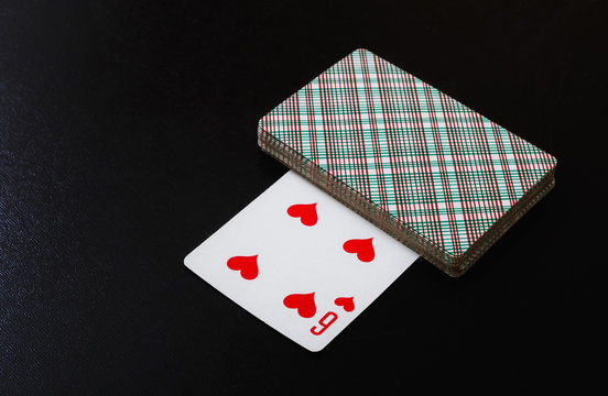 playing cards. Deck of playing cards ready to play on a black background