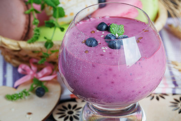 Delicious bilberry smoothie, detox yogurt or milkshake with fres