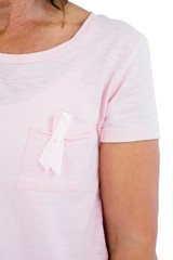 Midsection of woman wearing anti-violence ribbon