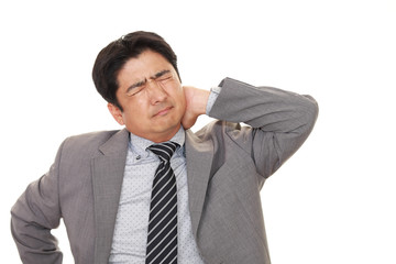疲れた表情のビジネスマン