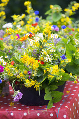 summerflowers in vase in summer garden