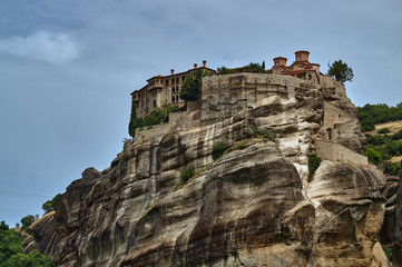 Fototapeta na wymiar The Orthodox medieval monastery on top rock Meteora.