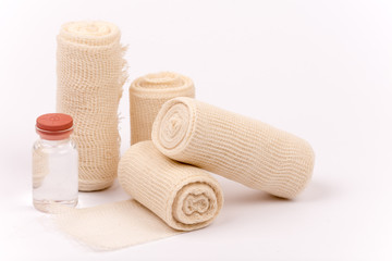 Bandage rolls and injection syringe bottle