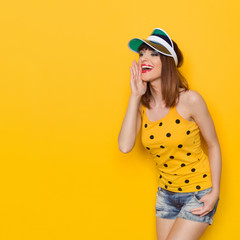 Naklejka premium Shouting Young Woman In Yellow Shirt