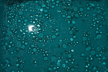 Cooking Oil Droplets in Colorful Water