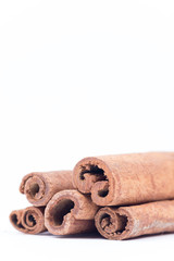 Cinnamon sticks isolated over white background