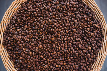 Wedding rings in coffee grains
