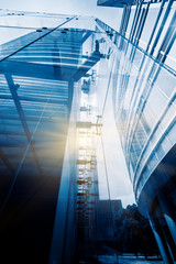 Plakat modern glass building,blue toned image