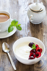 Breakfast with semolina porridge and berries