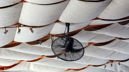Fan on the ceiling of summer restaurant 