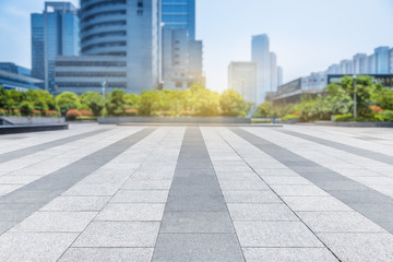 empty pavement front of modern architecture