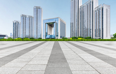 empty pavement front of modern architecture