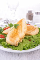 grilled chicken breast and salad