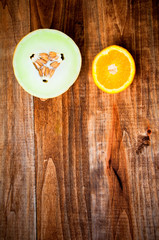 Fresh juicy fruits on a wooden background