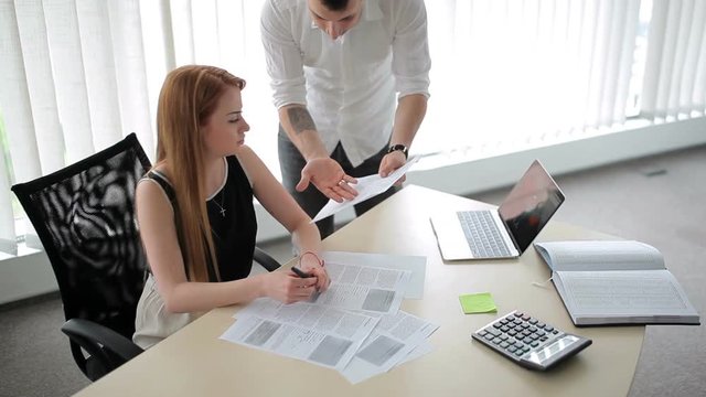 Girl quarells with man in the office