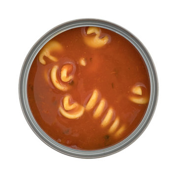 Can of rotini tomato soup on a white background opened top view.