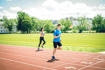 Obraz premium Running couple outdoors.