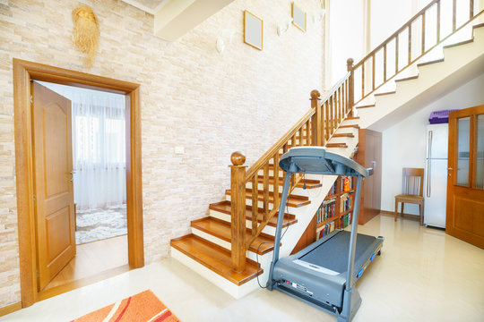 Interior of a hall with stairs in mini-hotel