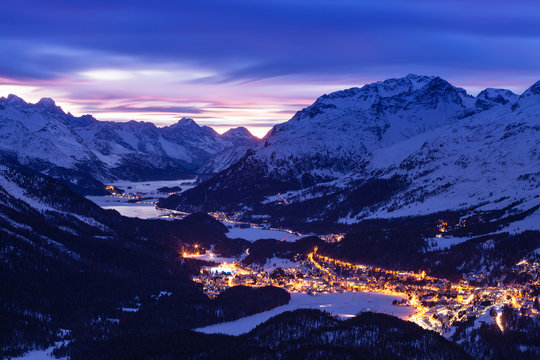 Town at dusk, illuminated, elevated view, Engadine, Switzerland