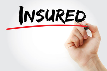 Hand writing Insured with marker, concept background