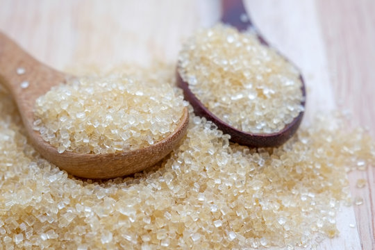 brown sugar heap on wooden table
