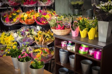 Flower vase arranged on a wooden worktop